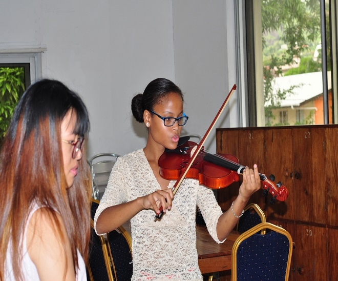 Student performing for instructor